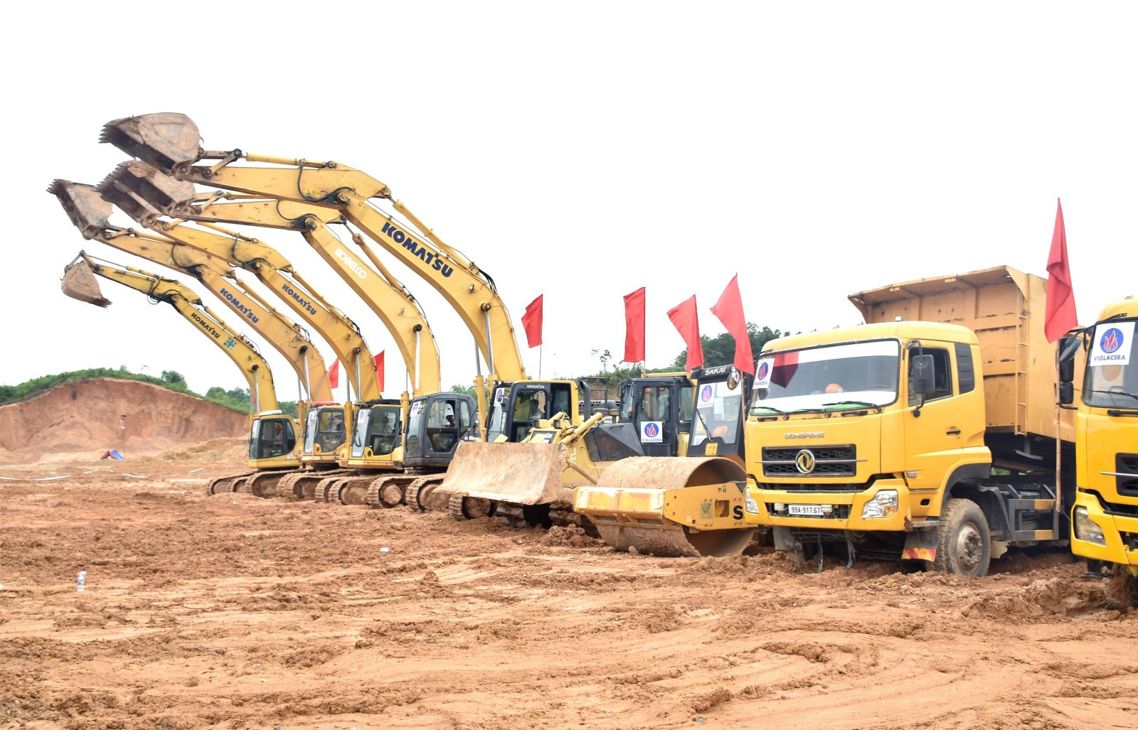 A group of construction vehiclesDescription automatically generated